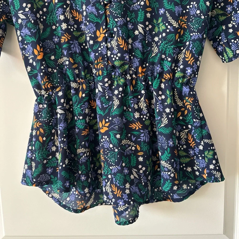 Sienna Sky Navy Floral Peplum Blouse with Green & Orange Accents - Picture 2 of 7